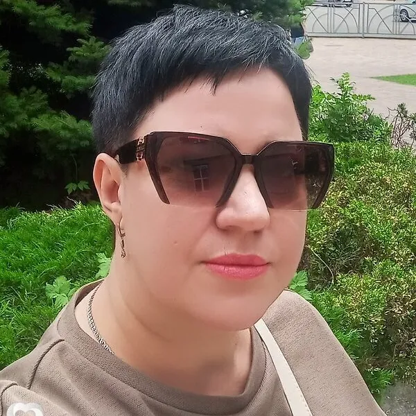 Мила